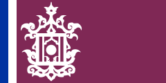 purple, ornate white gate, two thin blue-white stripes