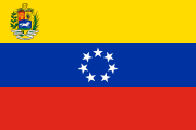 yellow-blue-red, ring of 7 white stars, coat of arms